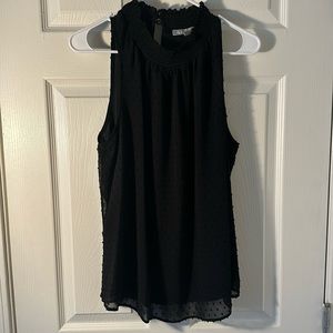 Black sleeveless blouse